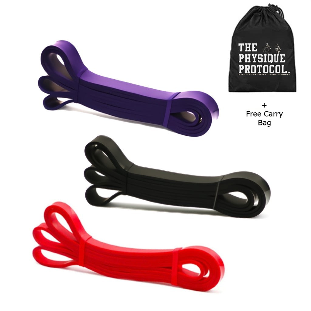 a collection of resistance bands that include a purple, red and black exercise band